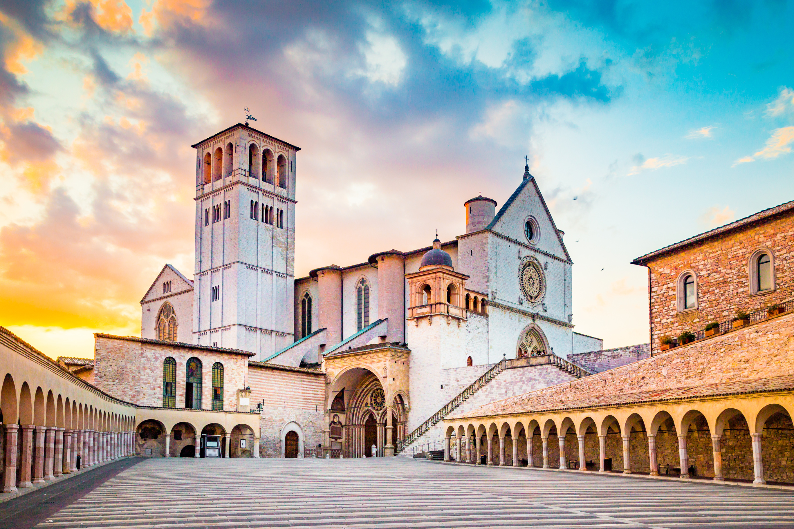 Basilica of St. Francis of Assisi at sunset, Assisi, Umbria, Italy